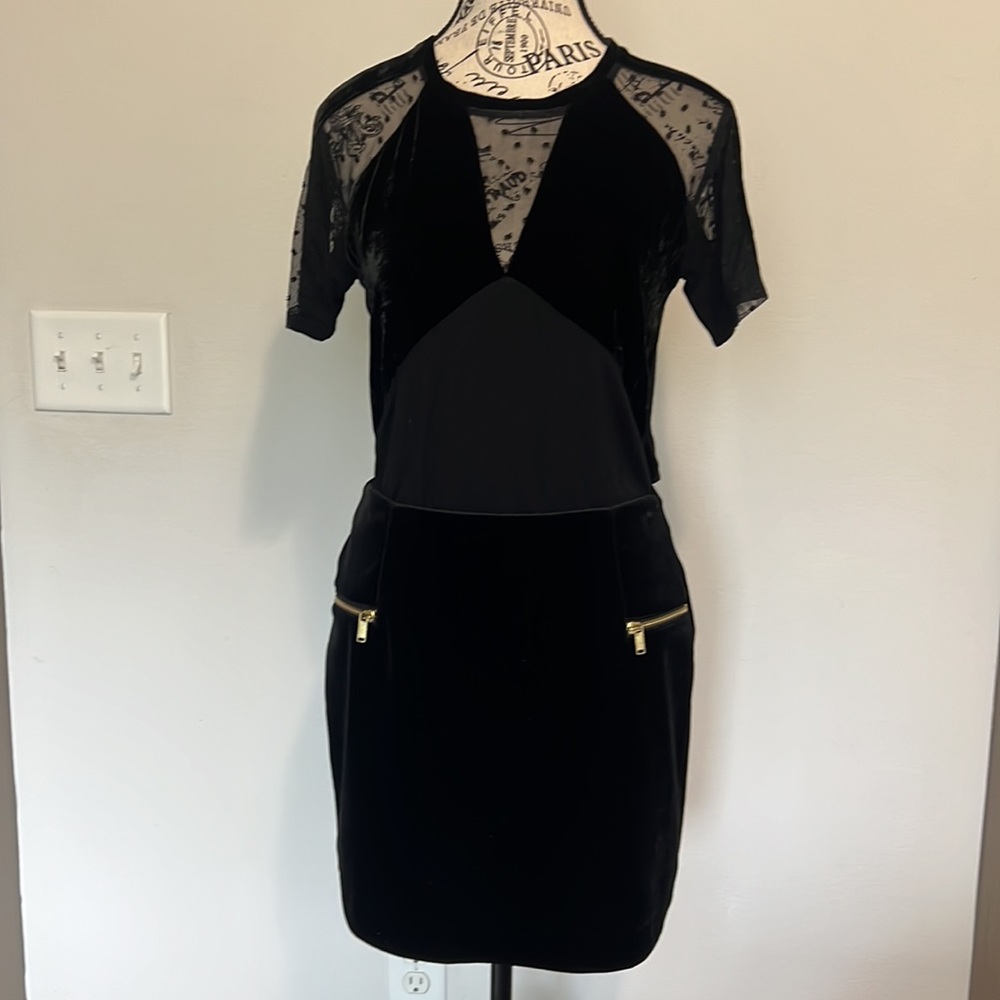 black mini a straight skirt, H&M, in a size small